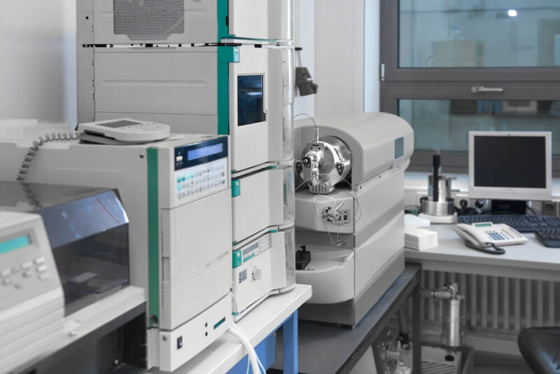 Modern laboratory interior out of focus, including equipment.